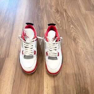 Size 12 Air Jordan 4’s white red black slightly used